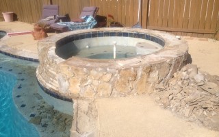 A $6500 pool tile and coping renovation/ remodel with scabos travertine tile and coping